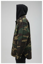 Front view of men’s quilted hooded jacket designed for warm winter streetwear style