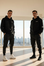Front view of men’s ribbon harem cargo joggers with elastic waist and streetwear style