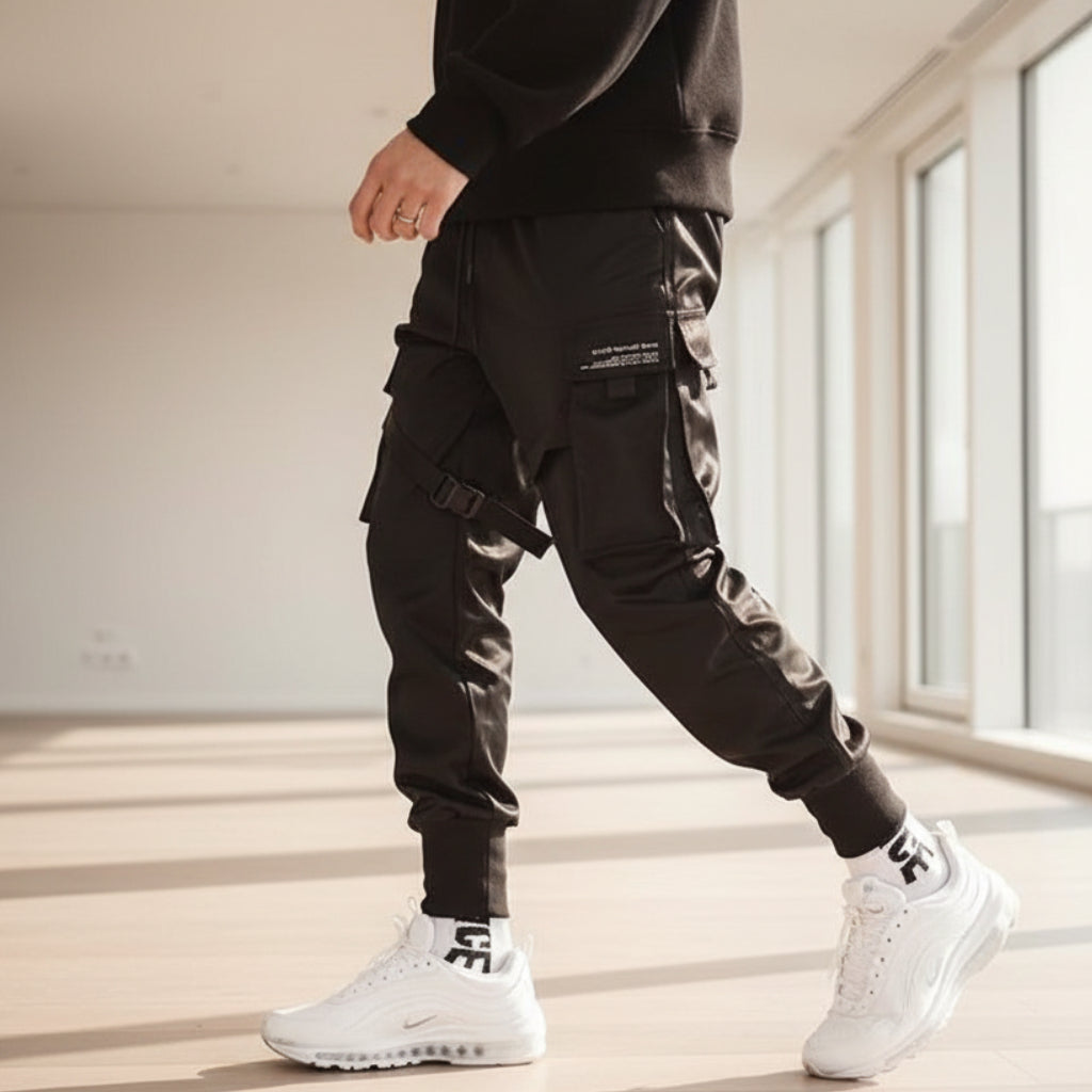 Front view of men’s ribbon harem cargo joggers with elastic waist and streetwear style