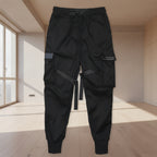 Front view of men’s ribbon harem cargo joggers with elastic waist and streetwear style