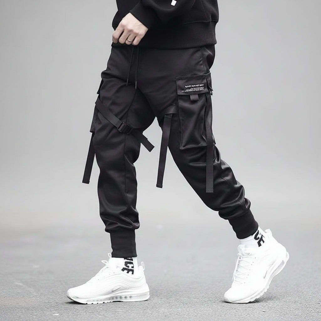 Front view of men’s ribbon harem cargo joggers with elastic waist and streetwear style