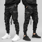 Front view of men’s ribbon harem cargo joggers with elastic waist and streetwear style