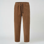 Front view of men’s winter corduroy jogger pants with simple streetwear design