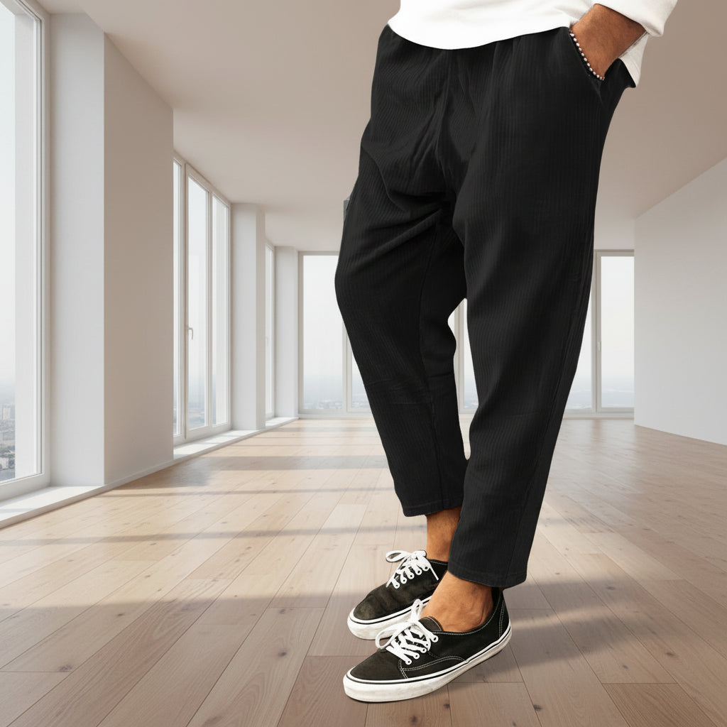 Front view of men’s winter corduroy jogger pants with simple streetwear design